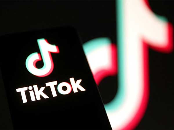 TikTok logo displayed on a phone screen as US and China reach a deal to keep the app operational (File Photo/Reuters)