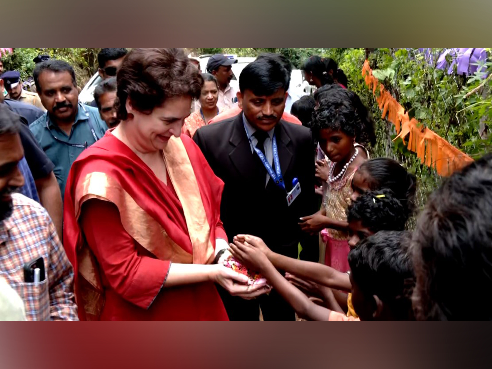 Congress MP Priyanka Gandhi interacts with children at the newly inaugrated anganwadi centre (Photo/ANI)