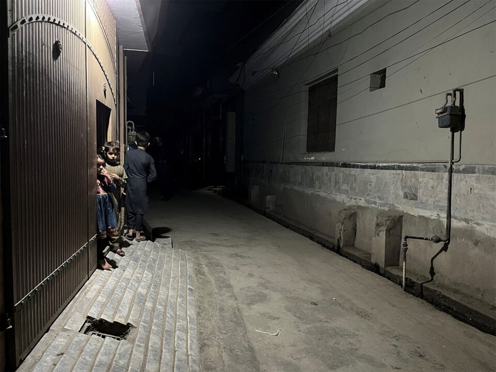 Children peep out of their homes after a tremor was felt (File Image/Reuters)