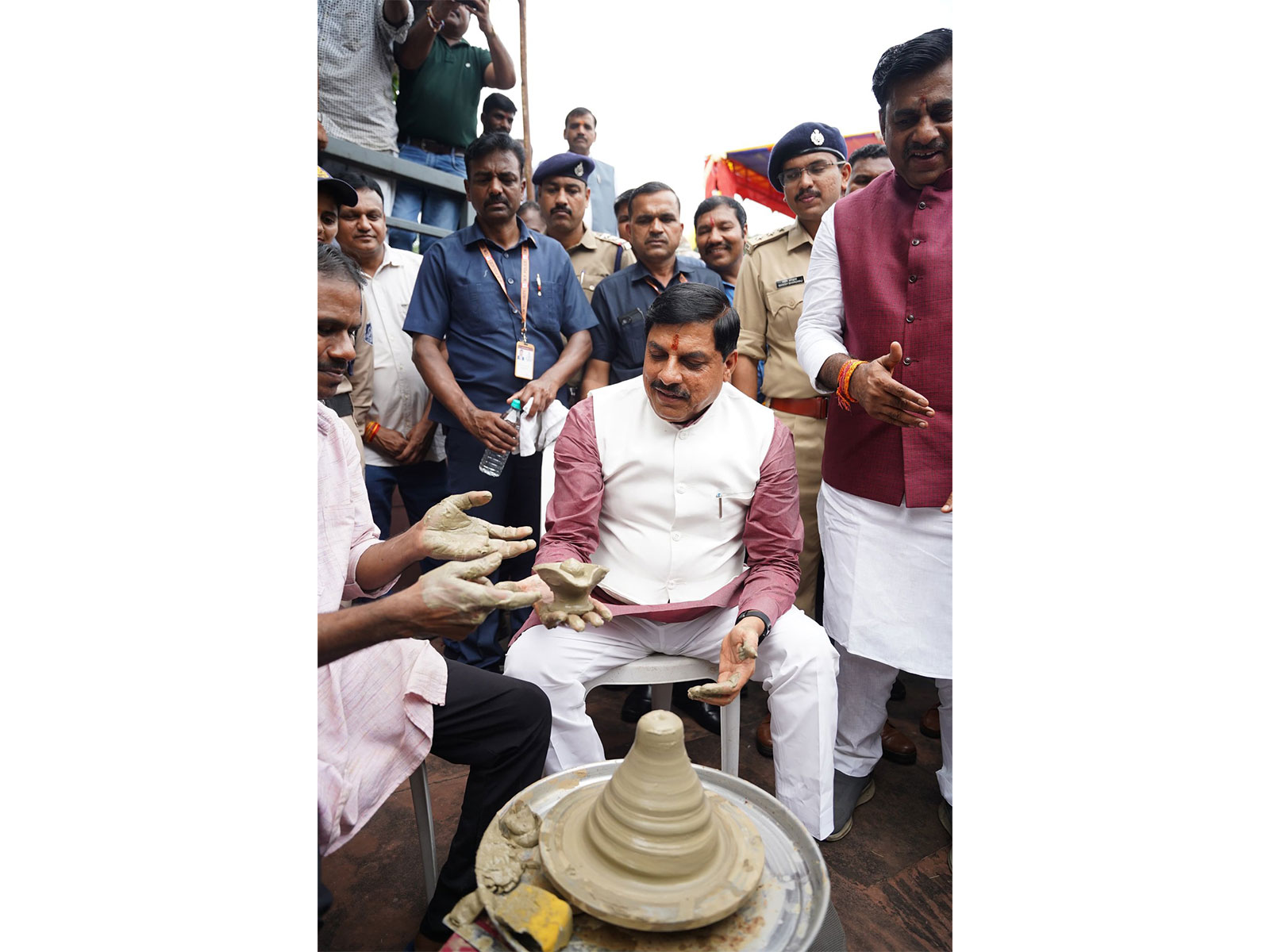 MP CM Mohan Yadav making Shivlinga from clay at Swadeshi Mela in Bhopal (Photo/X @DrMohanYadav51)