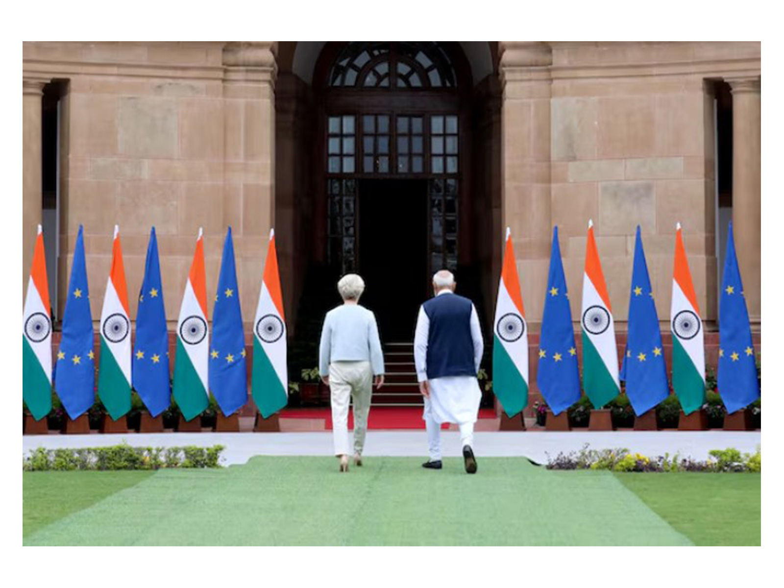 European Commission President Ursula von der Leyen and India's Prime Minister Narendra Modi walk after a photo opportunity ahead of their meeting at the Hyderabad House (Image/Reuters)