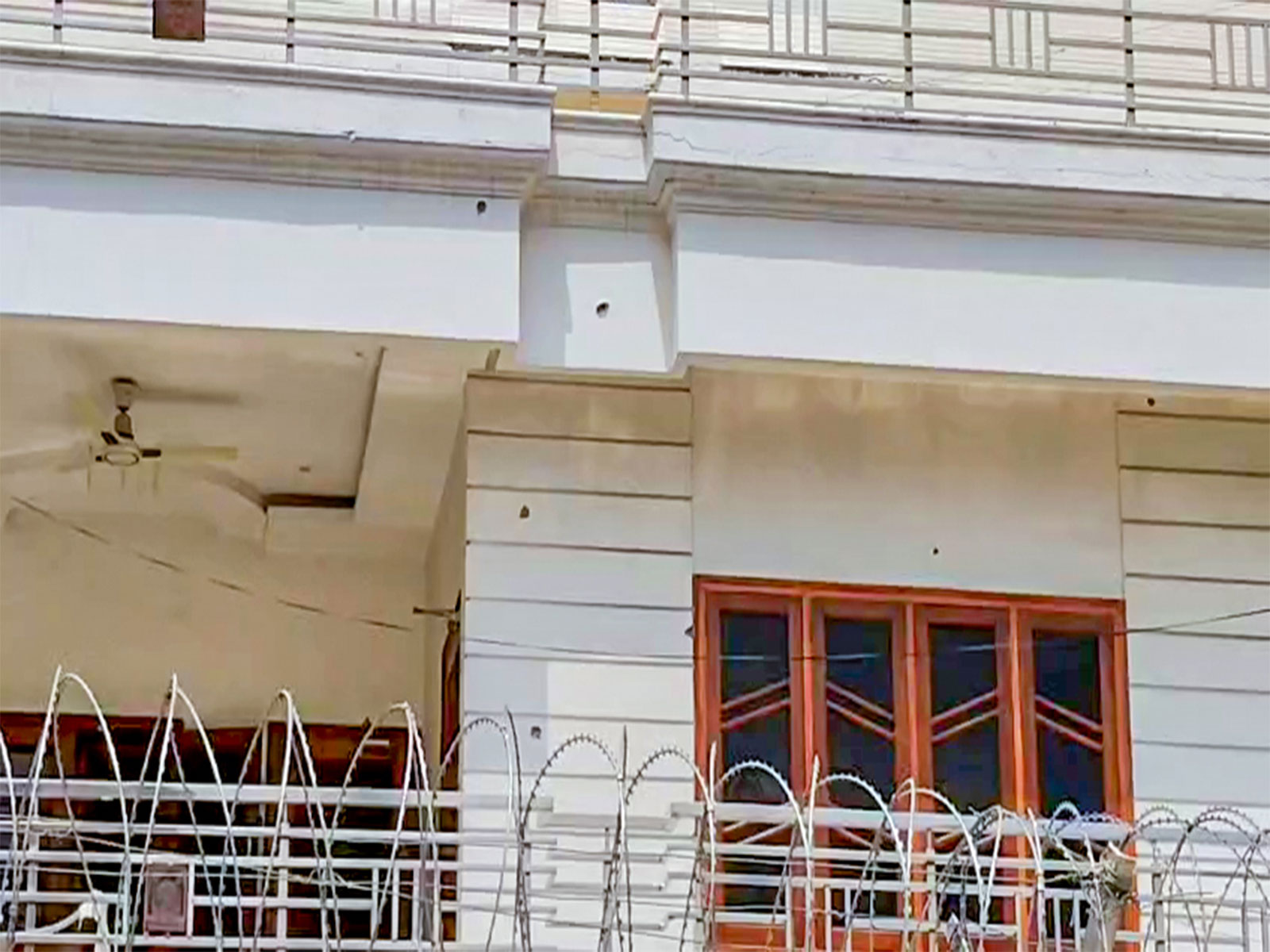 Bullet marks at actress Disha Patani's Bareilly residence (Photo/ANI)