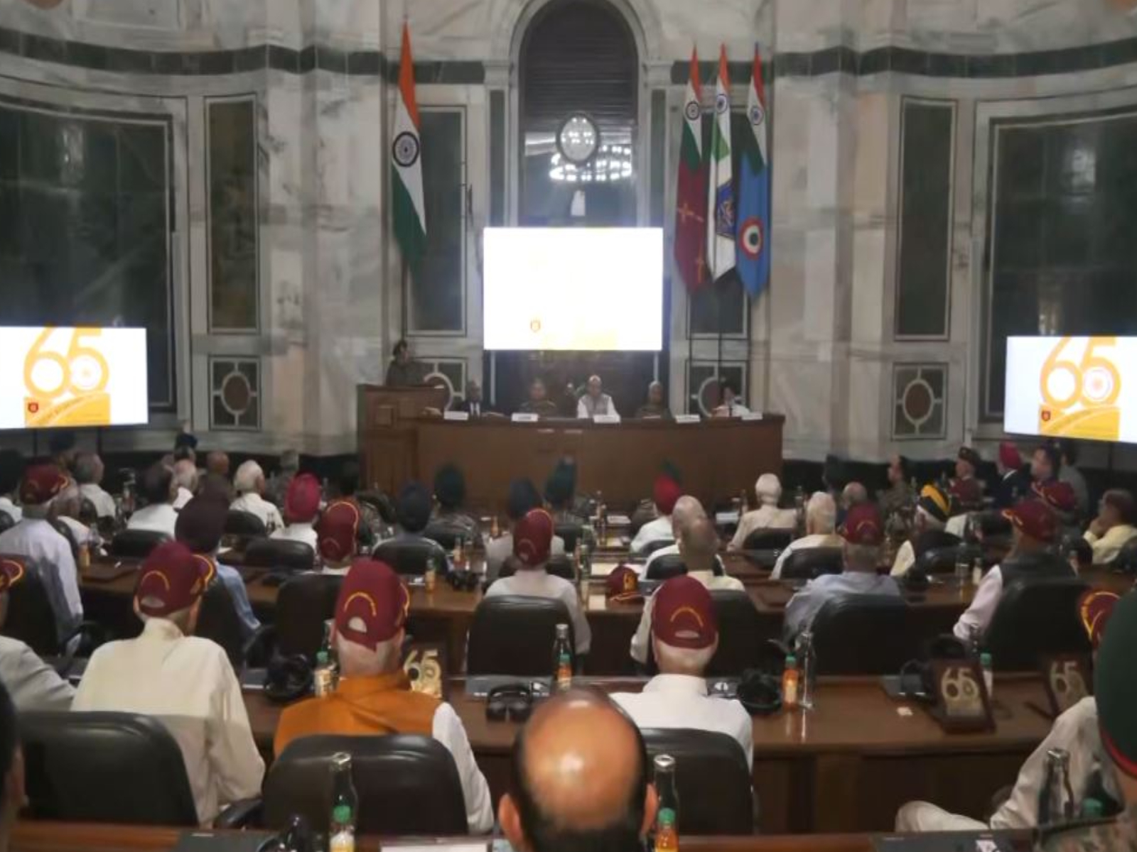 Rajnath Singh interacts with army veterans and families of 1965 war heros (Photo/ANI)