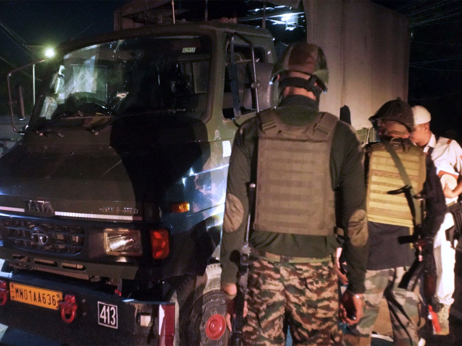 Security forces near Assam Rifles vehicle after terror attack in Bishnupur (Photo: ANI)