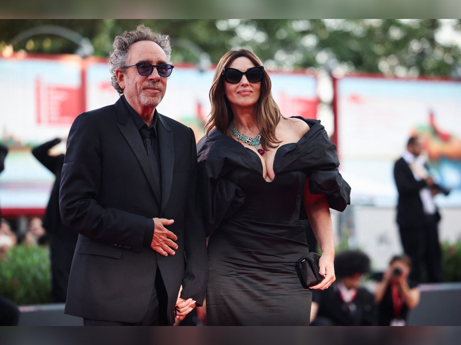 Actor Monica Bellucci, Director Tim Burton (File photo: Reuters)