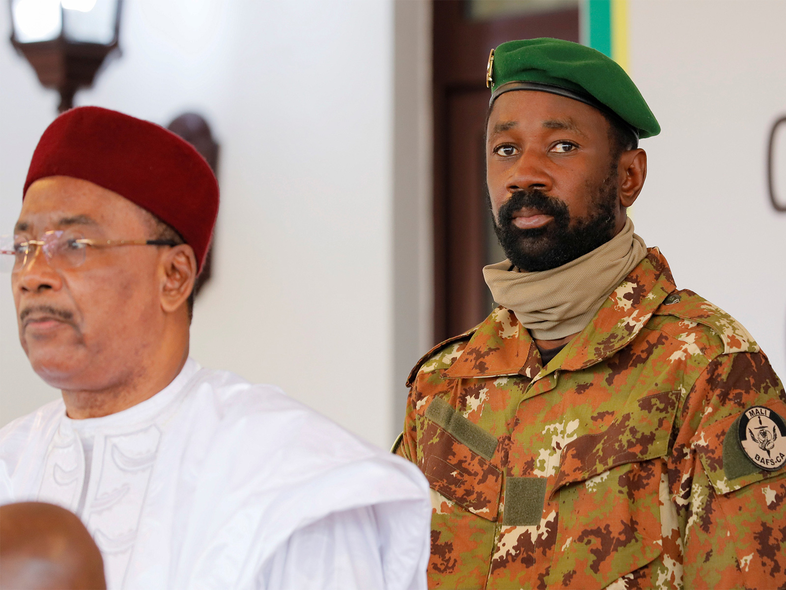 Mali’s ties with France have strained since Assimi Goita, right, seized power in a coup four years ago (File Photo/Reuters)