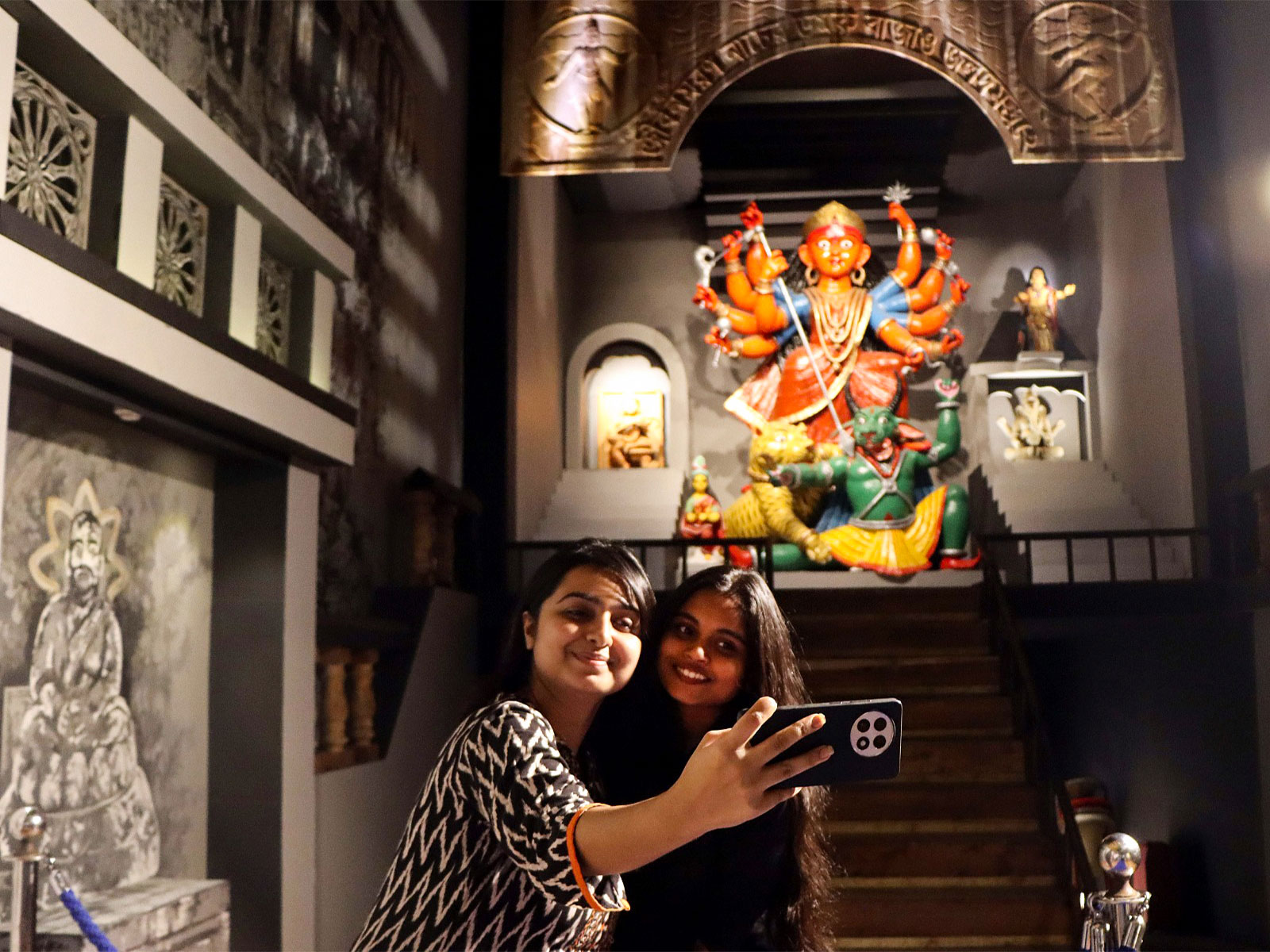 Girls click a selfie during the inauguration of the Durga Puja festival  (File Photo/ ANI)