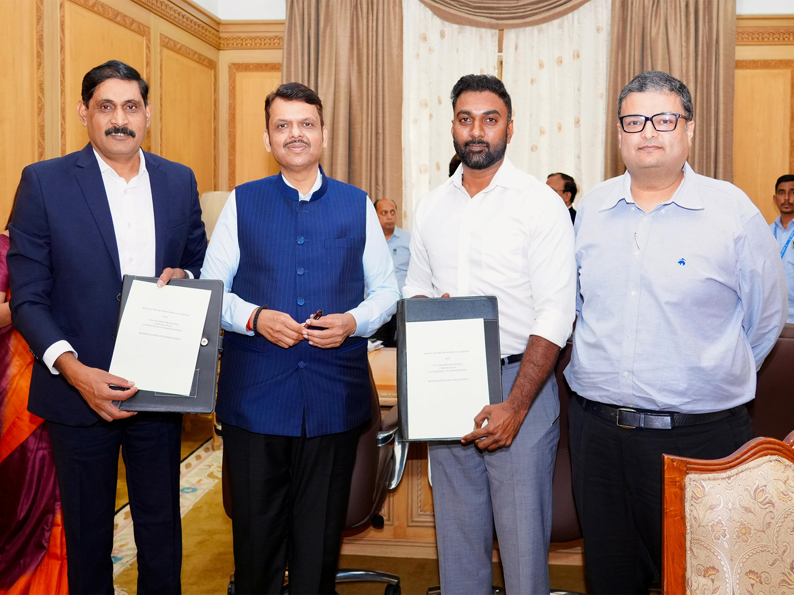 Maharashtra Chief Minister Devendra Fadnavis signing of an MOU between RPPL and NMMC (Image: IRF)