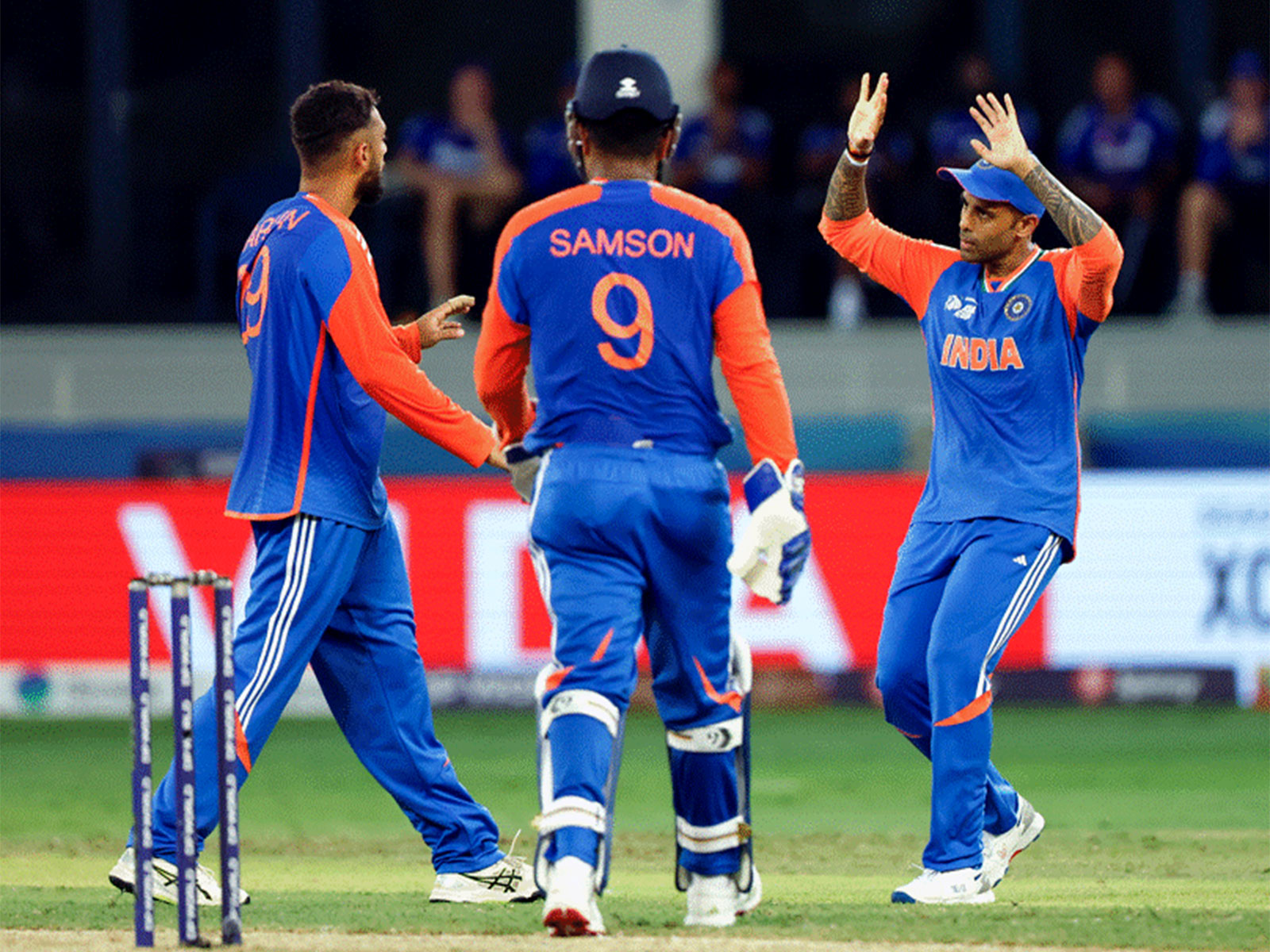 Varun Chakravarthy, Sanju Samson and skipper Suryakumar celebrating (Photo/ANI) 