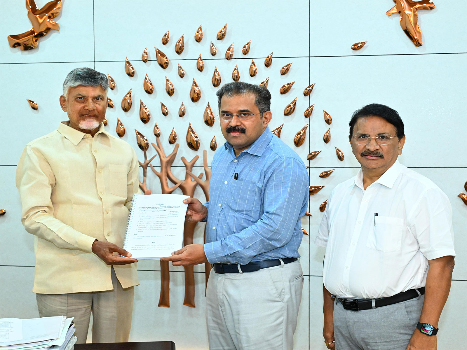 Andhra Pradesh Chief Minister N Chandrababu Naidu releases a booklet on GOs. (Photo/ANI)