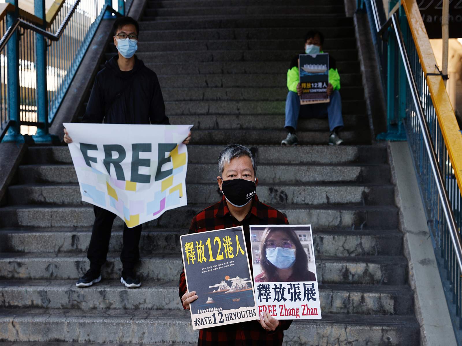 Pro-democracy supporters protest to urge for the release citizen journalist Zhang Zhan outside China's Liaison Office, in Hong Kong (Photo/Reuters) Pro-democracy supporters protest to urge for the release citizen journalist Zhang Zhan outside China's Liaison Office, in Hong Kong (Photo/Reuters)