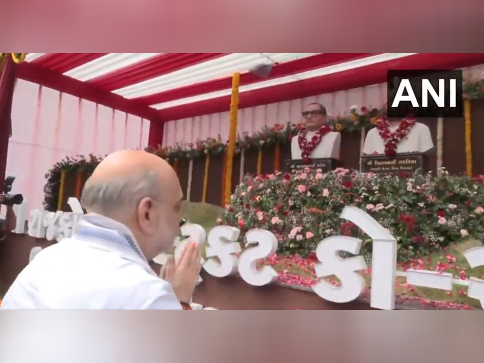 Home Minister Amit Shah unveils statues of RDC Bank Ex-Chairmen. (Photo/ANI)