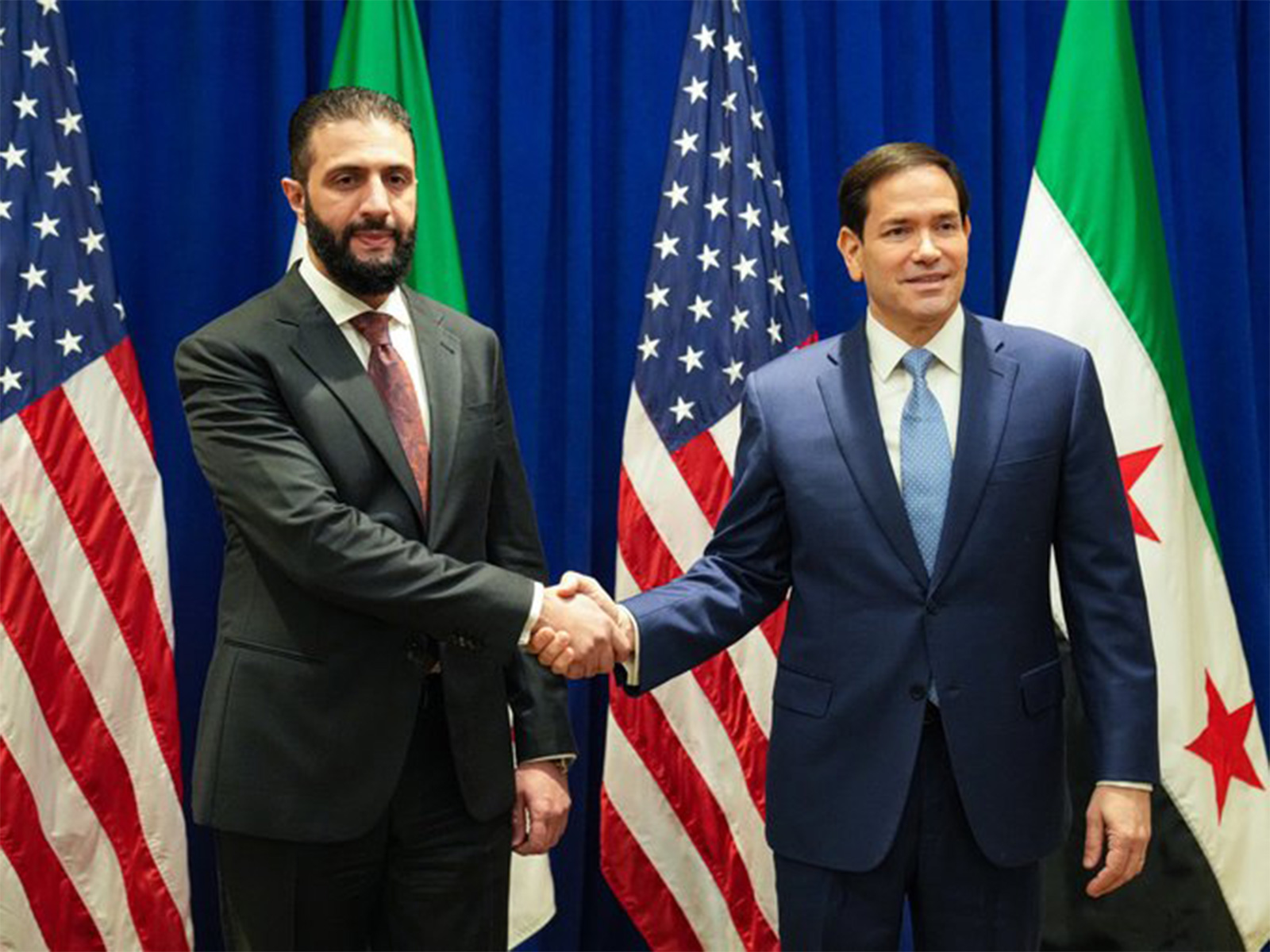 Syrian President al-Sharaa with US Secretary of State Marco Rubio (Right) (Photo credit/@SecRubio))