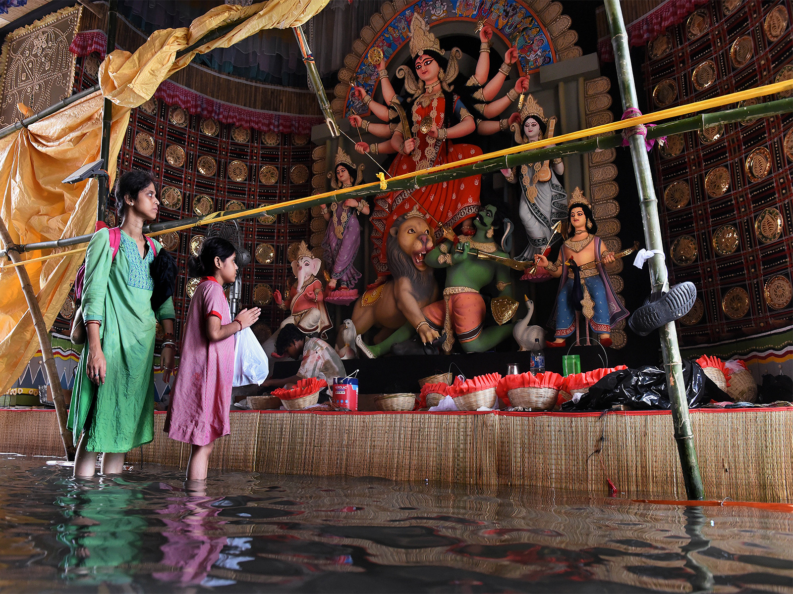 Durga puja pandal gets waterlogged after heavy rainfall in Kolkata (Photo/ANI)