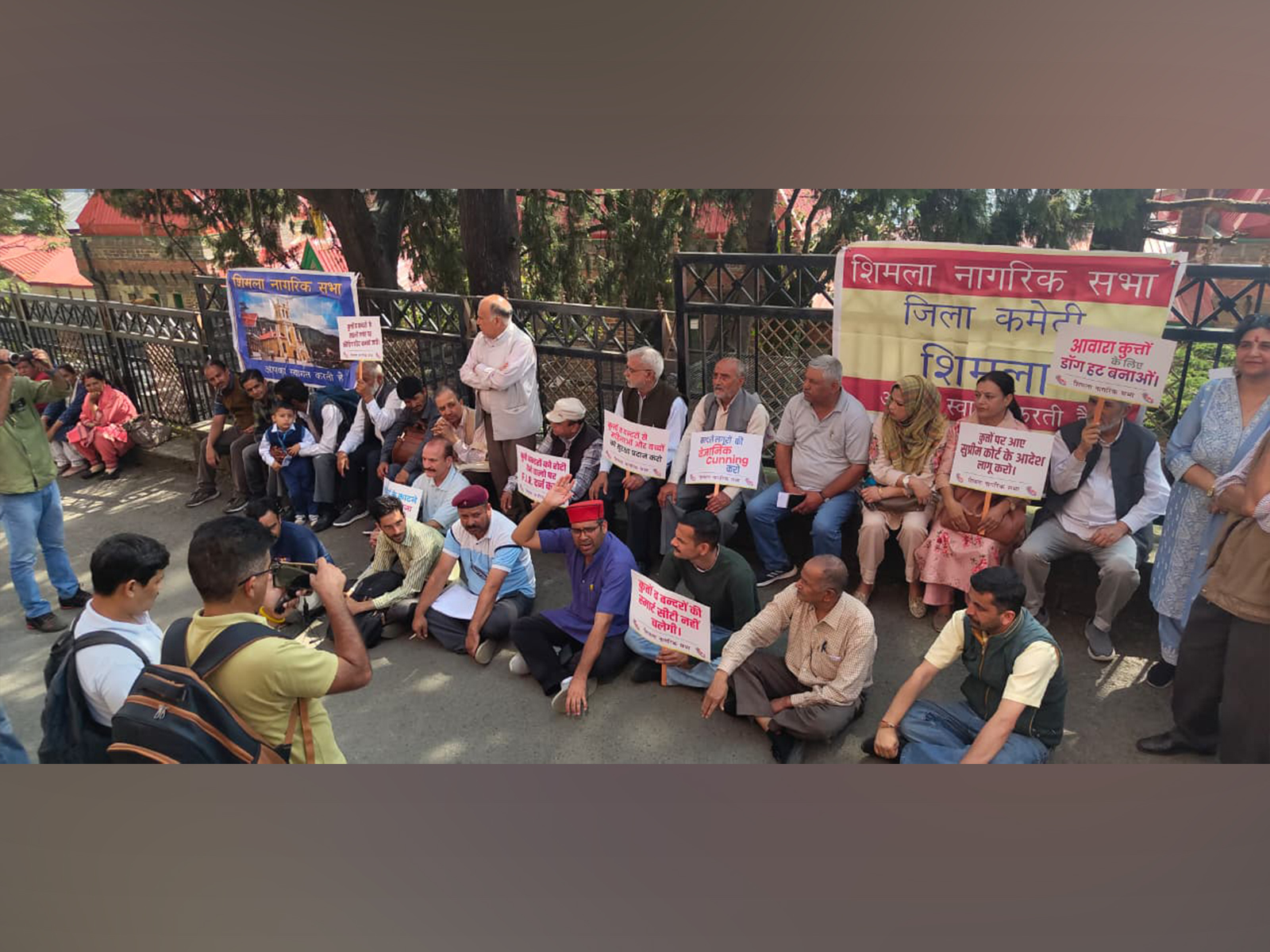 The Shimla Citizens’ Forum on Monday staged a protest against the alleged increasing threat posed by stray dogs and monkeys in the city, (Photo/ANI)