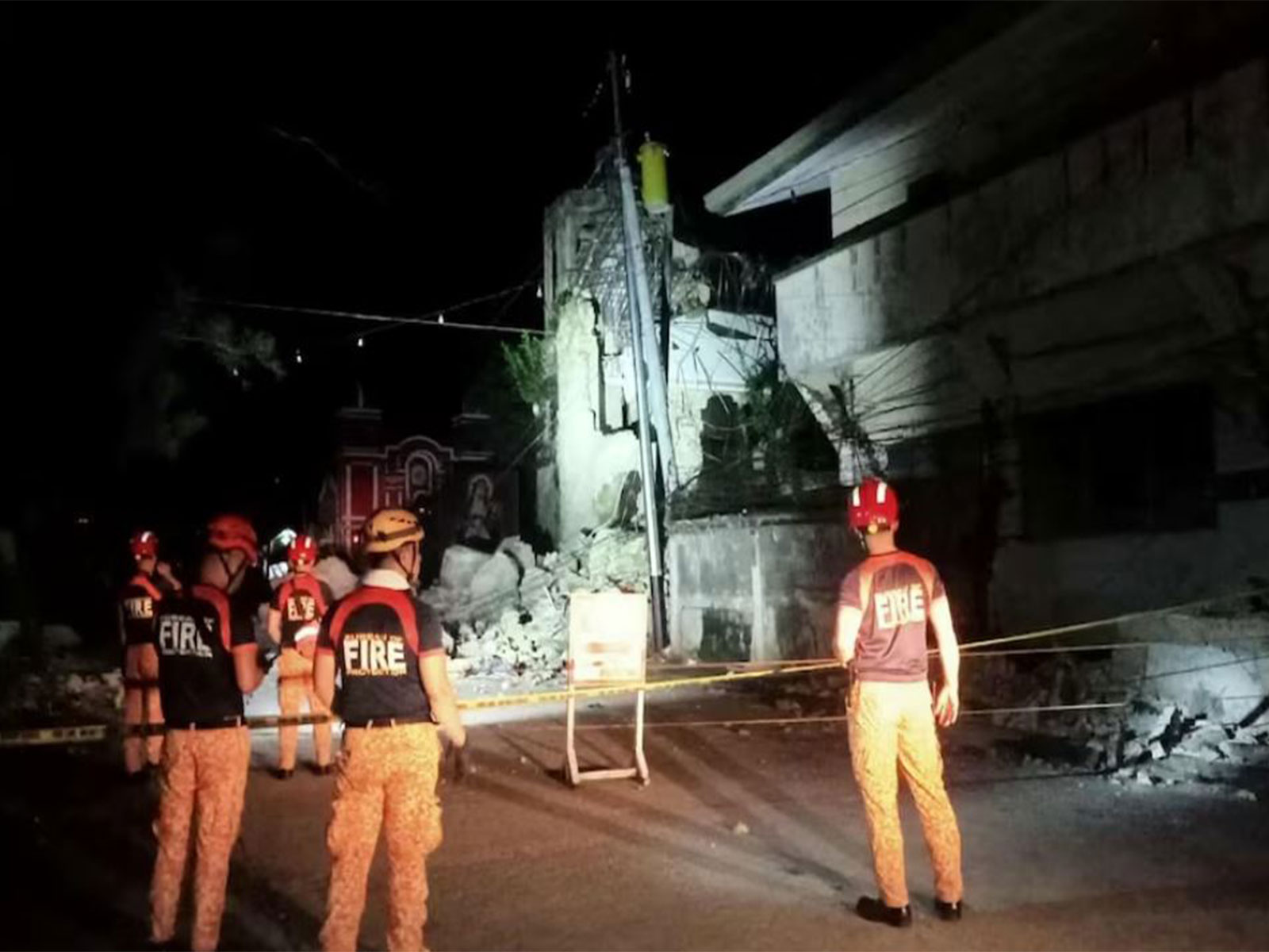 Rescue personnel stand in front of a damaged structure following a 6.9-magnitude earthquake, in Daanbantayan, Cebu Province, Philippines (Photo/ Reuters) Rescue personnel stand in front of a damaged structure following a 6.9-magnitude earthquake, in Daanbantayan, Cebu Province, Philippines (Photo/ Reuters)