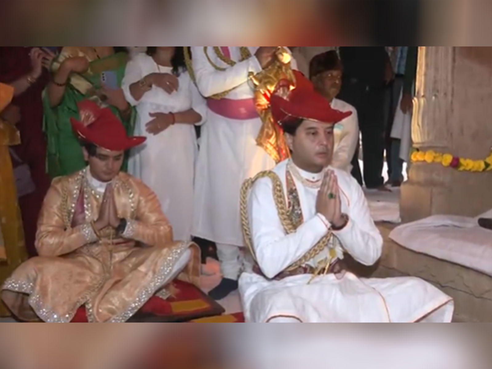 Union Minister Jyotiraditya Scindia along with his son performing the Puja at Deoghar (Photo/ANI)
