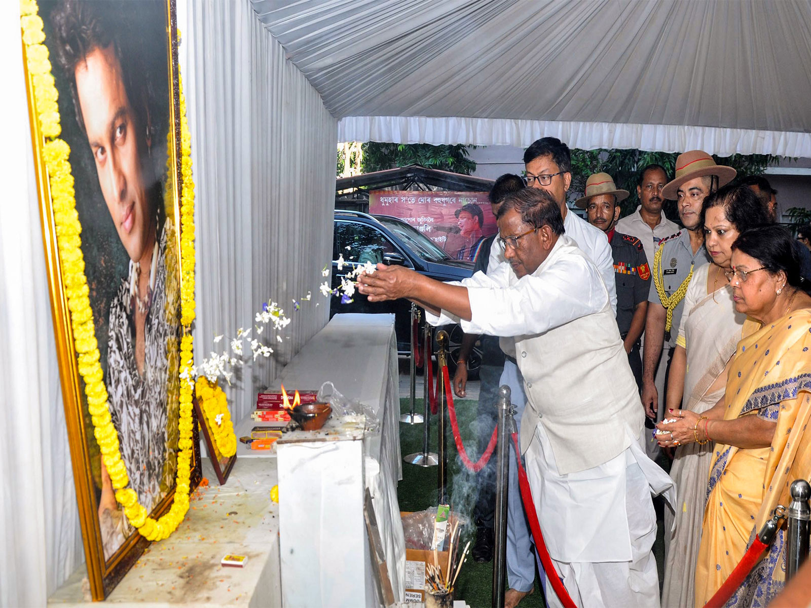 Assam Governor Lakshman Prasad Acharya pays floral tribute to Assamese singer Zubeen Garg (Photo/ANI)