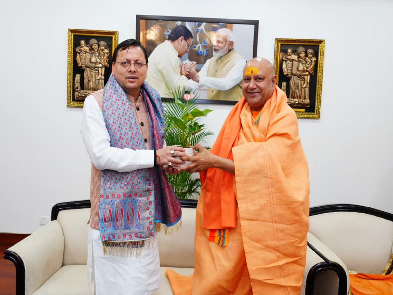 Uttarakhand CM Dhami meets Mahamandaleshwar Swami Yatindranand Giri Maharaj. (Photo/ANI)