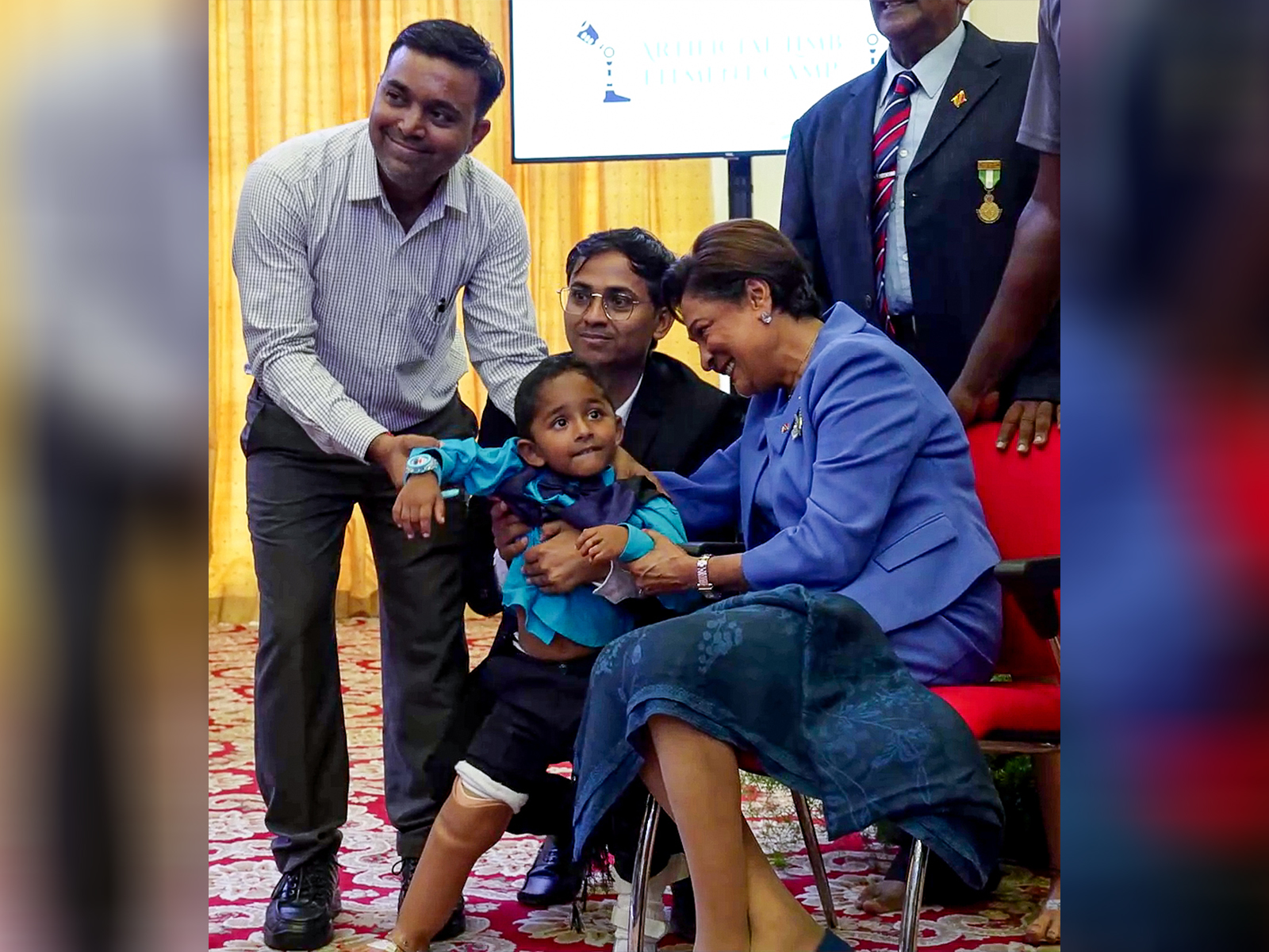 PM of Trinidad and Tobago Kamla Persad-Bissessar with recipients of the Jaipur Foot Artificial Limb Fitment Camp (Photo/ANI) PM of Trinidad and Tobago Kamla Persad-Bissessar with recipients of the Jaipur Foot Artificial Limb Fitment Camp (Photo/ANI)