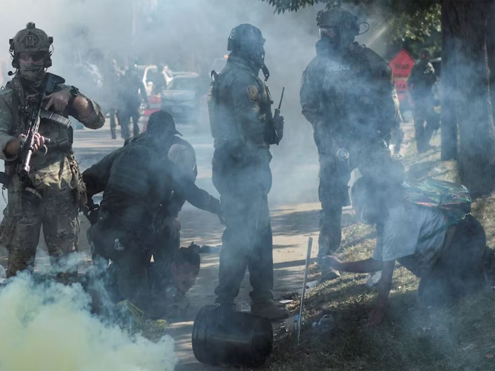 Tear gas rises during a standoff with ICE and federal officers in the Little Village neighborhood of Chicago, Illinois (Image/Reuters)