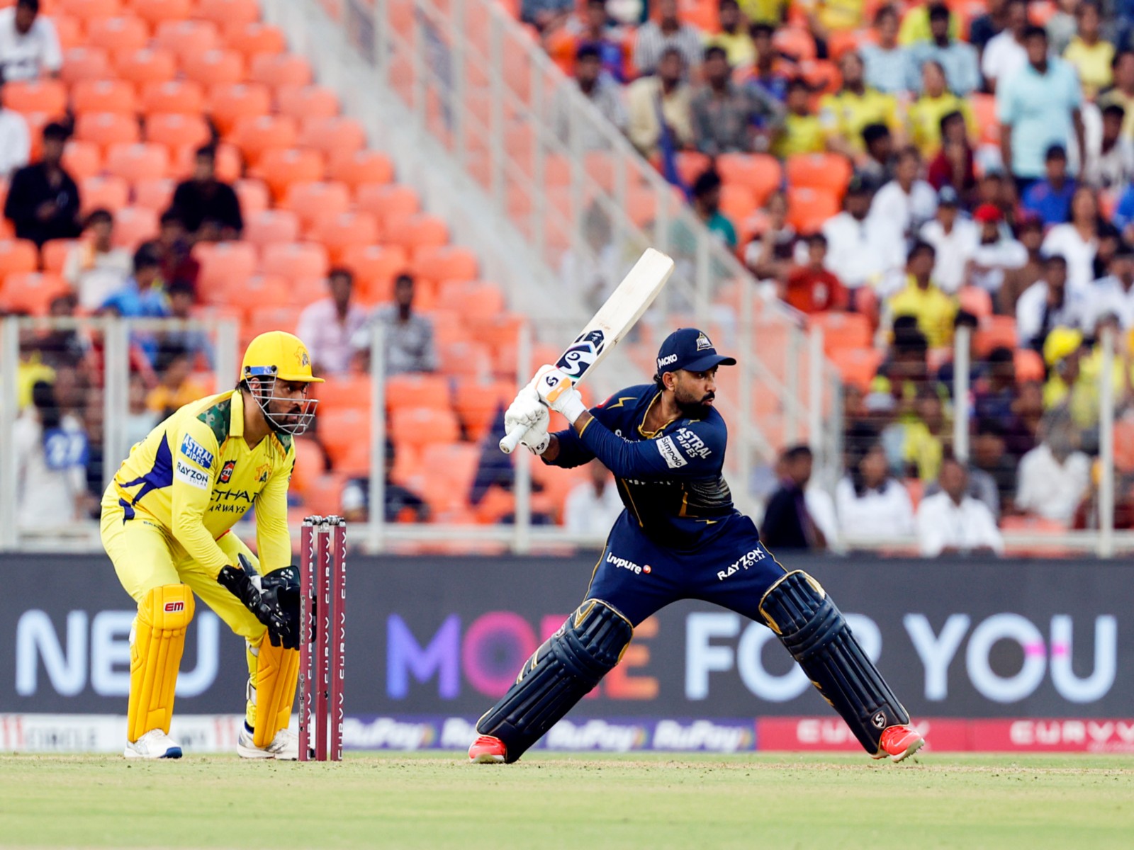Rahul Tewatia batting and MS Dhoni wicketkeeping. (Photo/ANI)