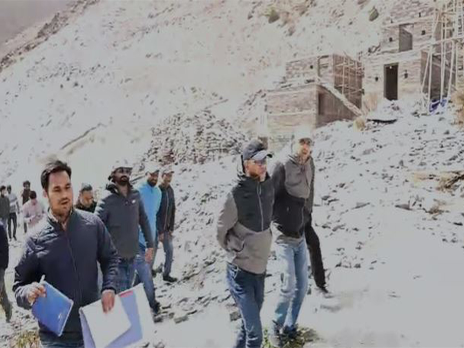 Uttarkashi DM Prashant Arya reviews progress of ongoing construction works in Jadong village (Photo/ANI)