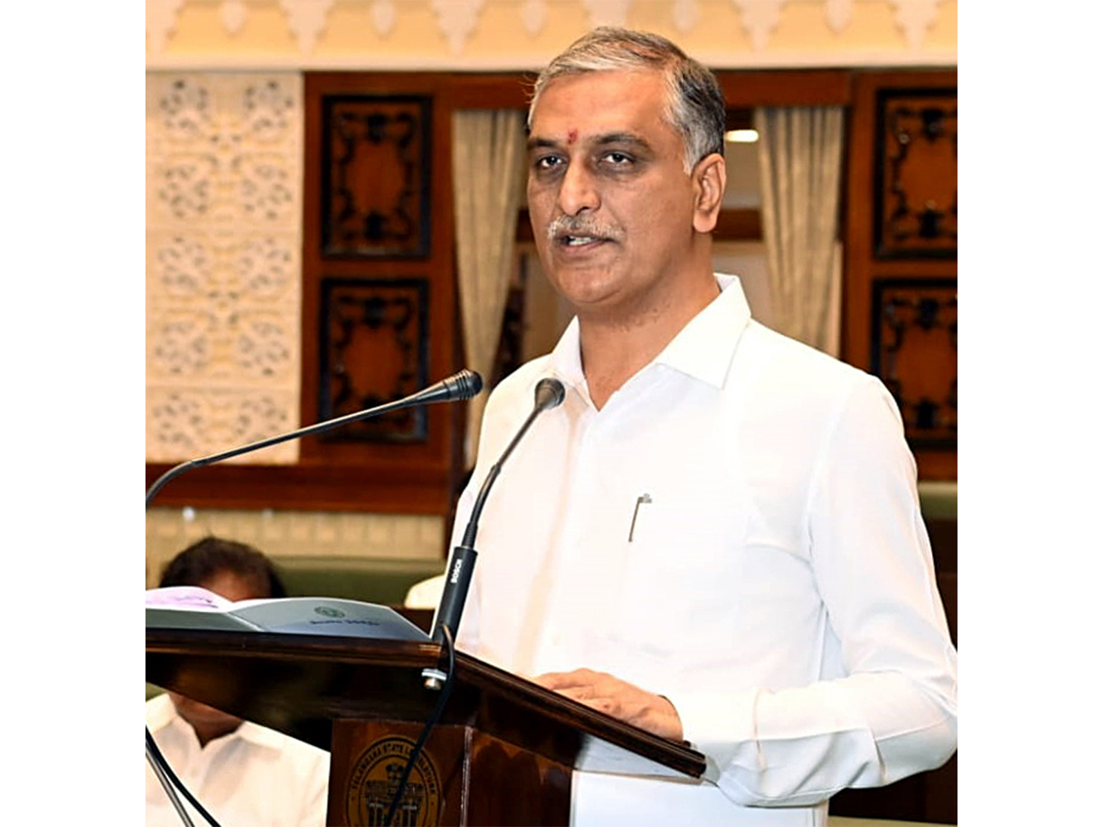 BRS leader and former minister Harish Rao intreacting with people in flood affected areas (Photo/ANI)