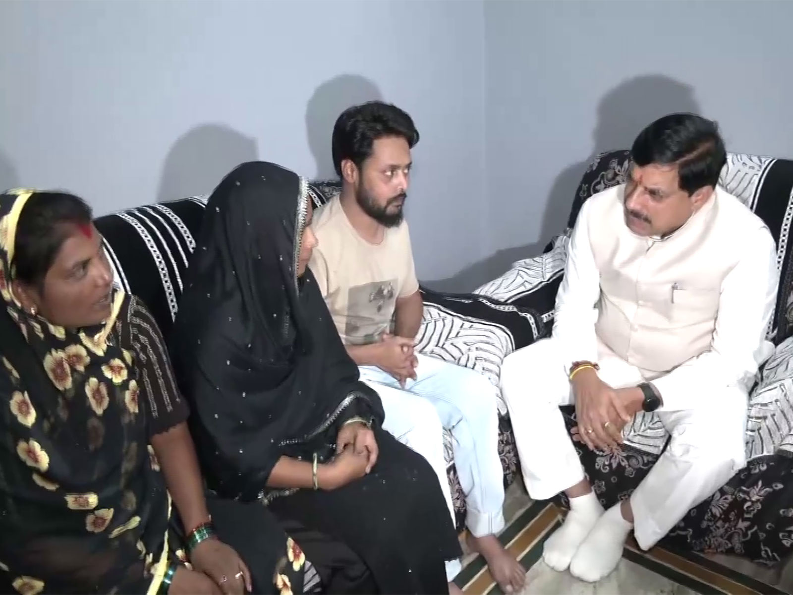 MP CM Mohan Yadav is talking to the families of Children lost life in Chhindwara cough syrup tragedy (Photo/ANI)