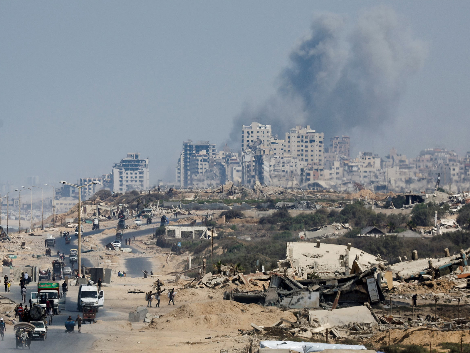 Smoke billows over Gaza City during an Israeli military operation (File Photo/Reuters)