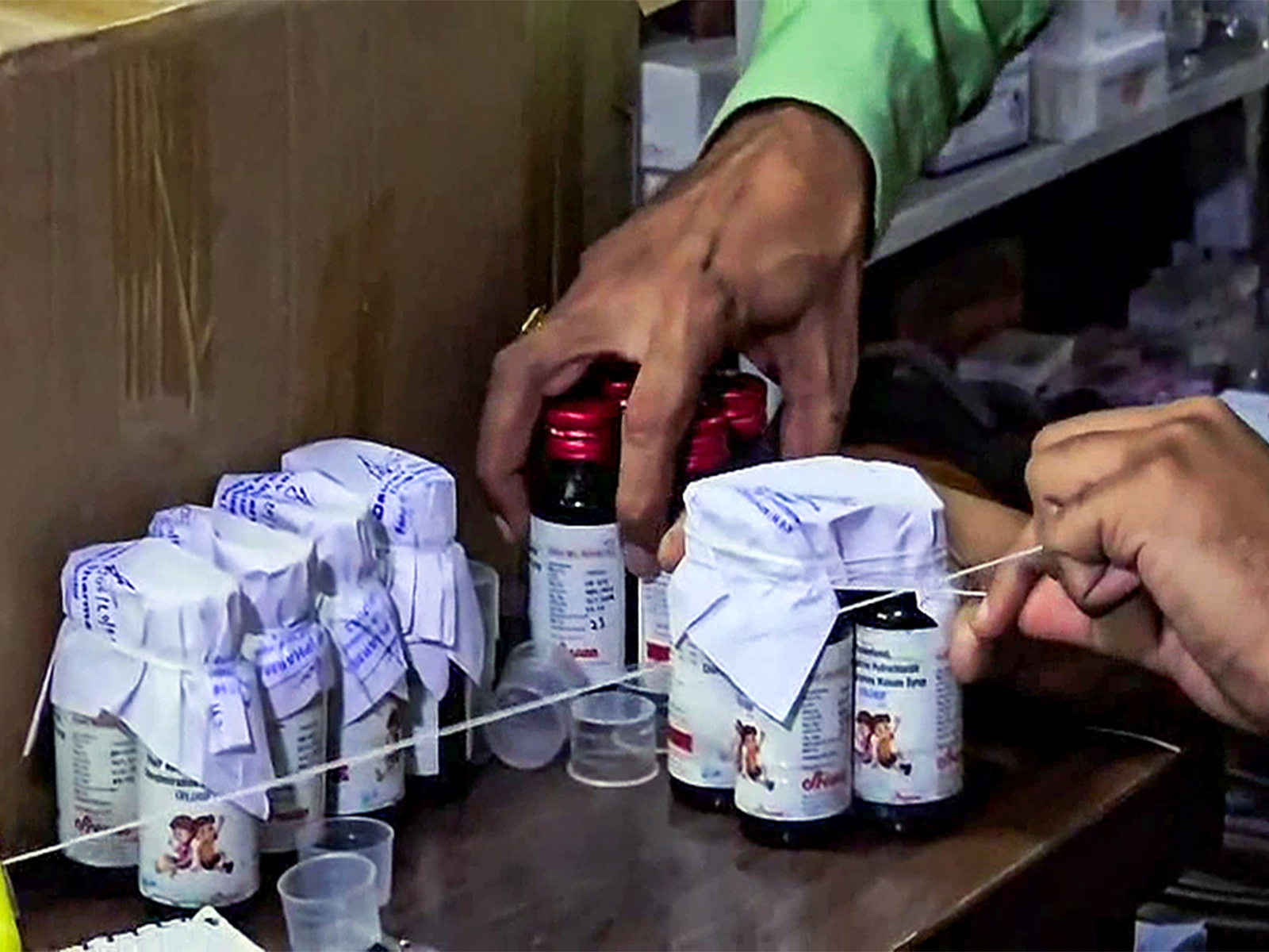 The Drugs Department sealing the Coldrif cough syrup containers (File Photo/ANI)