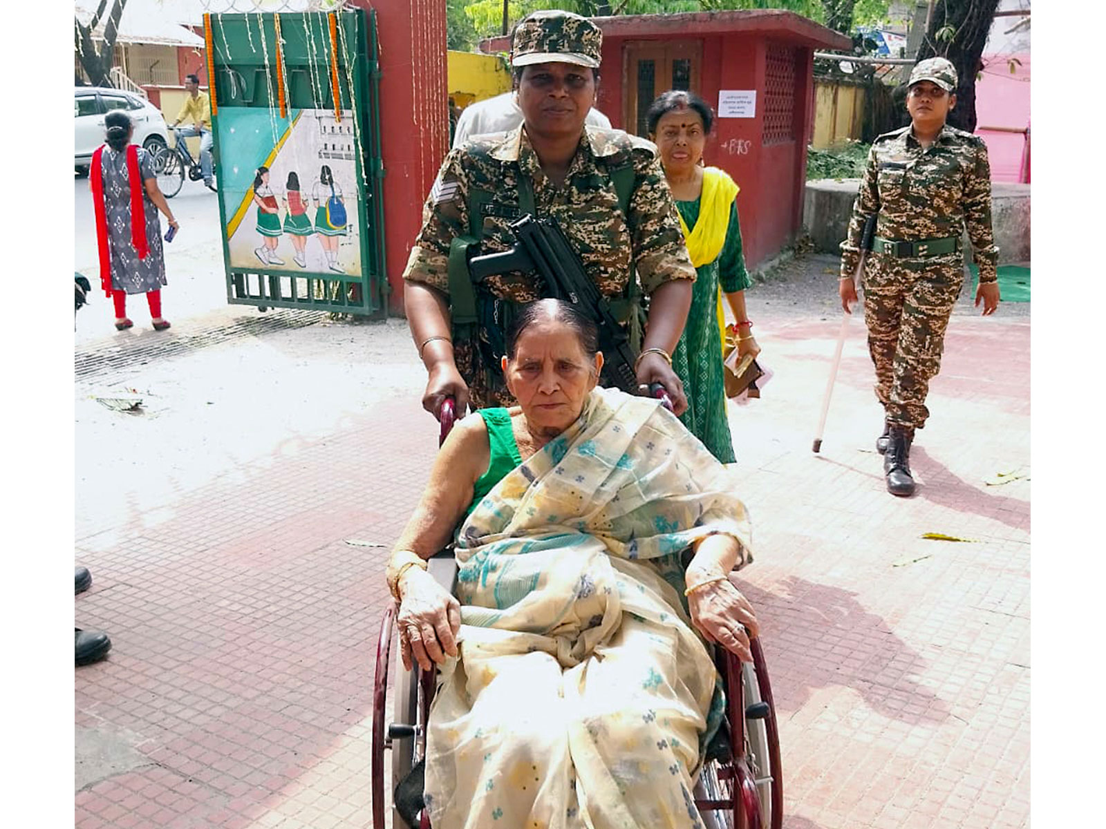 CAPF personnel helping PwD elector reach polling station (File Photo/ANI) CAPF personnel helping PwD elector reach polling station (File Photo/ANI)