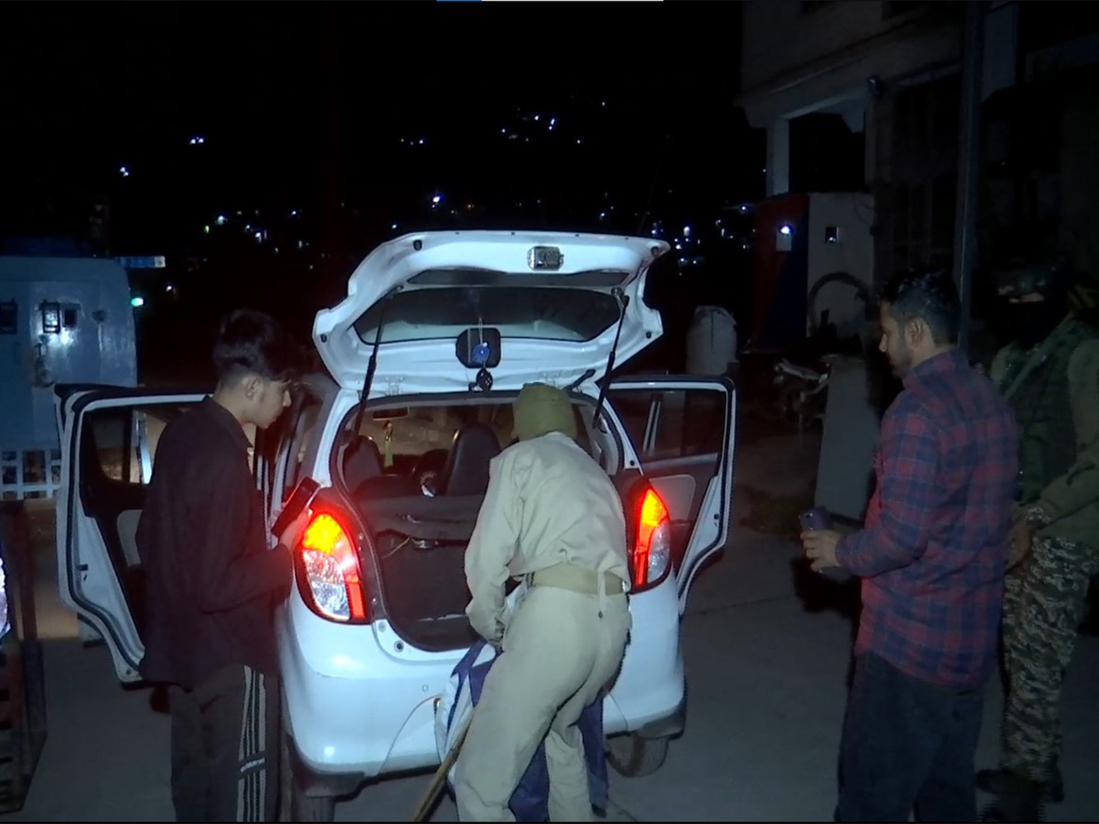 Police conduct checks at Rajouri-Kotranka Budhal road. (Photo/ANI)