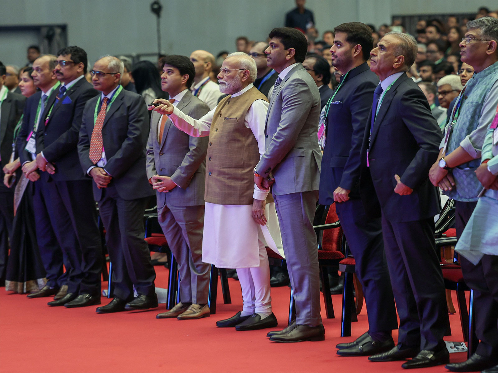 PM Modi with Akash Ambani, Chairman Reliance Jio Infocomm and other delegates at IMC 2025 (Photo/ANI)