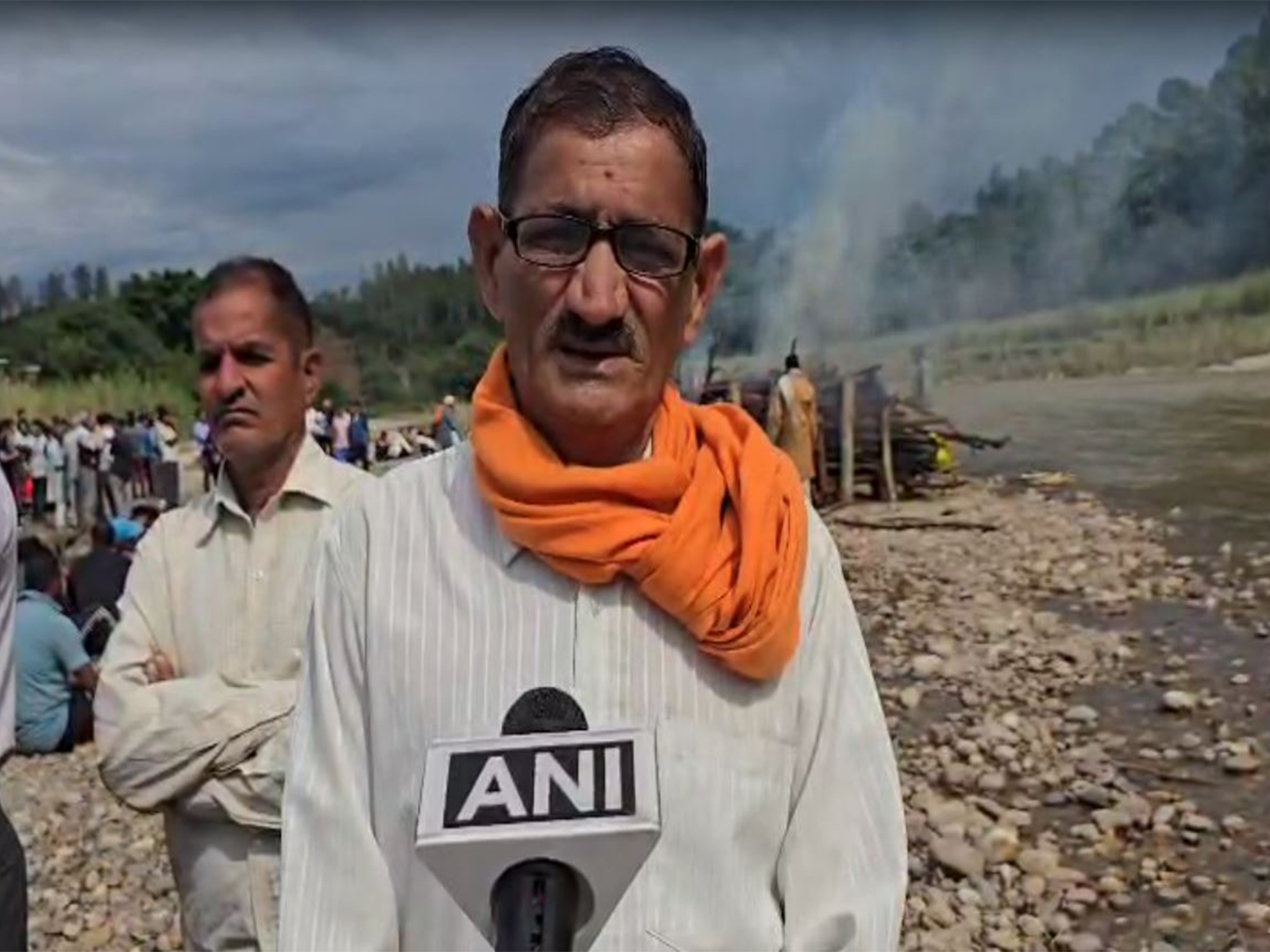 A resident of the village where the last rites of four members of a family, who died in the bus accident, were performed on Wednesday   (Photo/ANI)