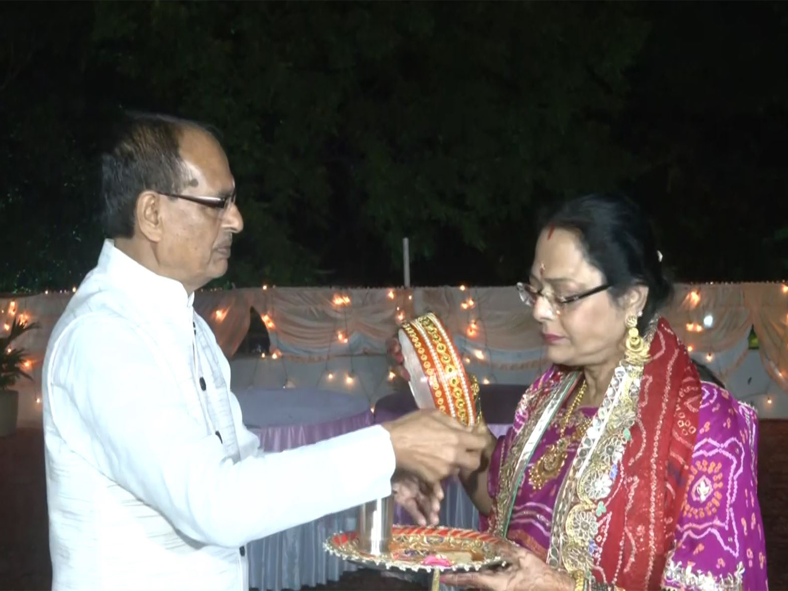 Union Minister Shivraj Singh Chouhan performs Karva Chauth rituals with his wife Sadhna Singh (Photo/ANI)