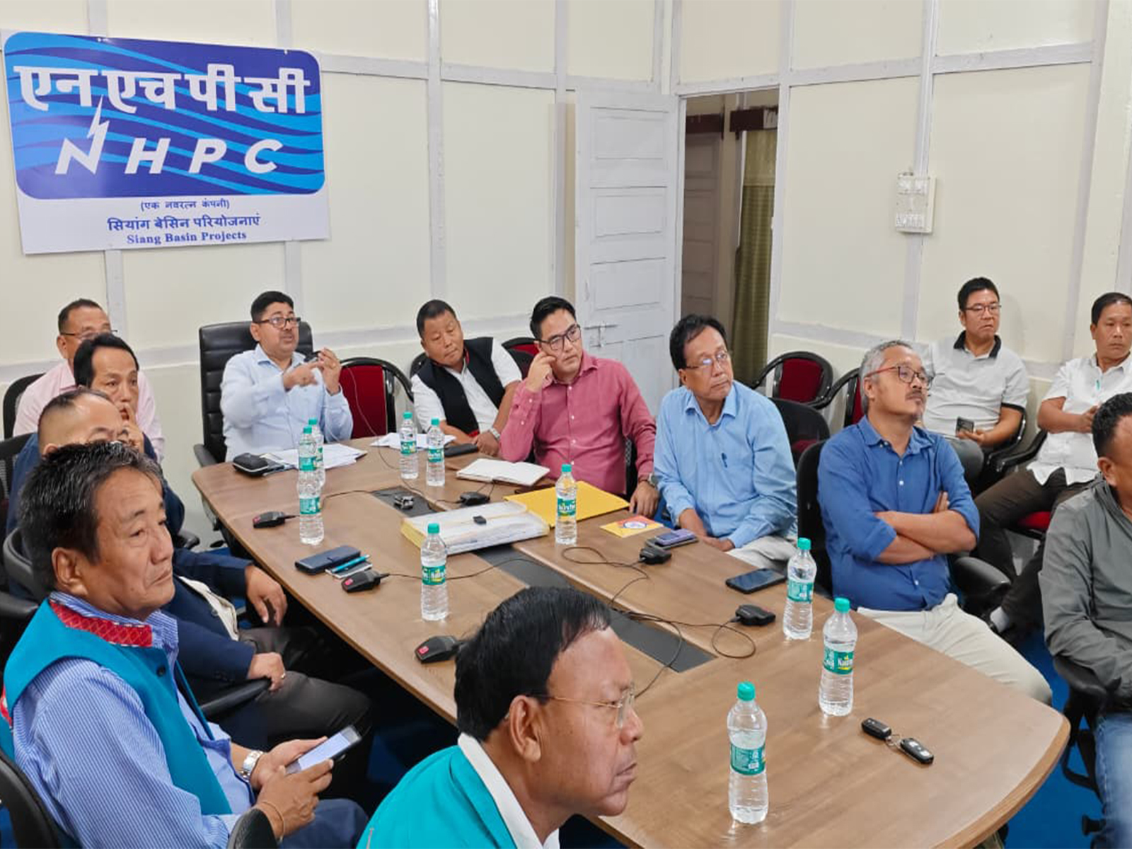 NHPC and ESDDAPF representatives discuss the Siang Upper Multipurpose Project at Pasighat (Photo/NHPC)