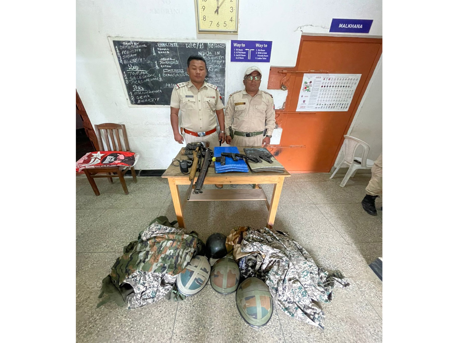 Manipur Police with arms and ammunition recovered (Photo/X@manipur_police)