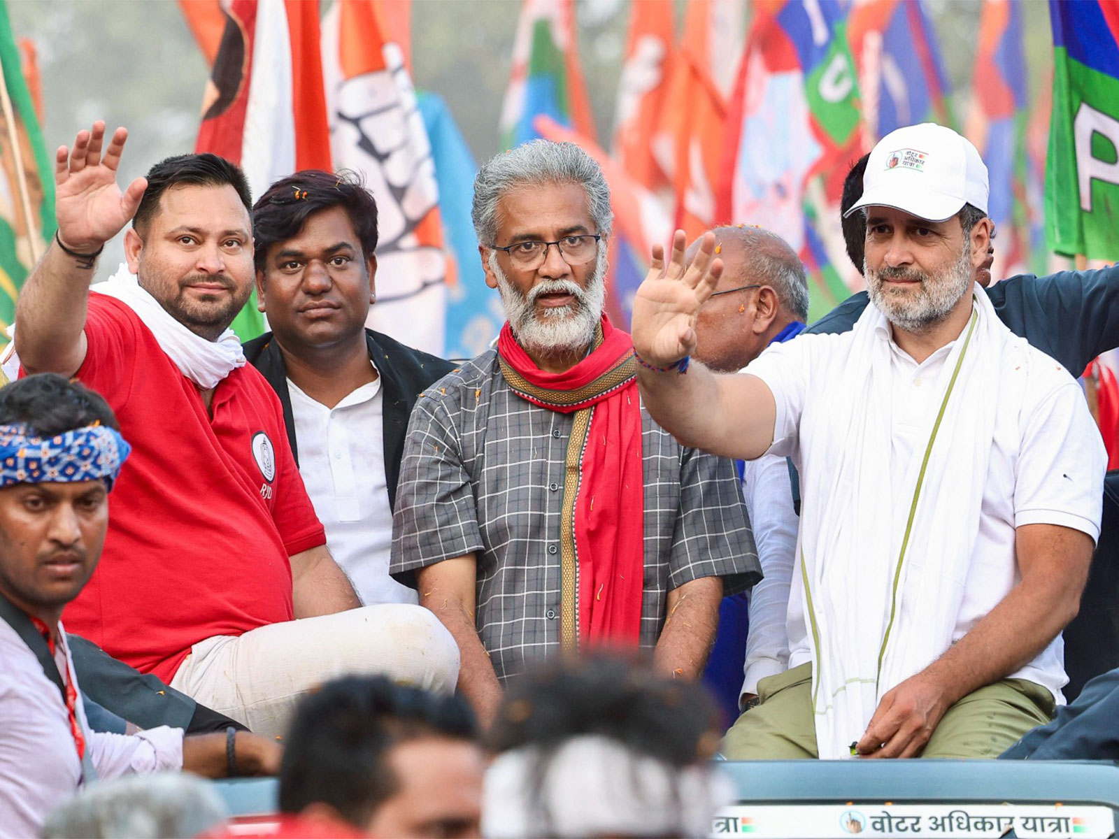 RJD leader Tejashwi Yadav,  CPI (ML) leader Dipankar Bhattacharya and Congress leader Rahul Gandhi  (File Photo/ANI)