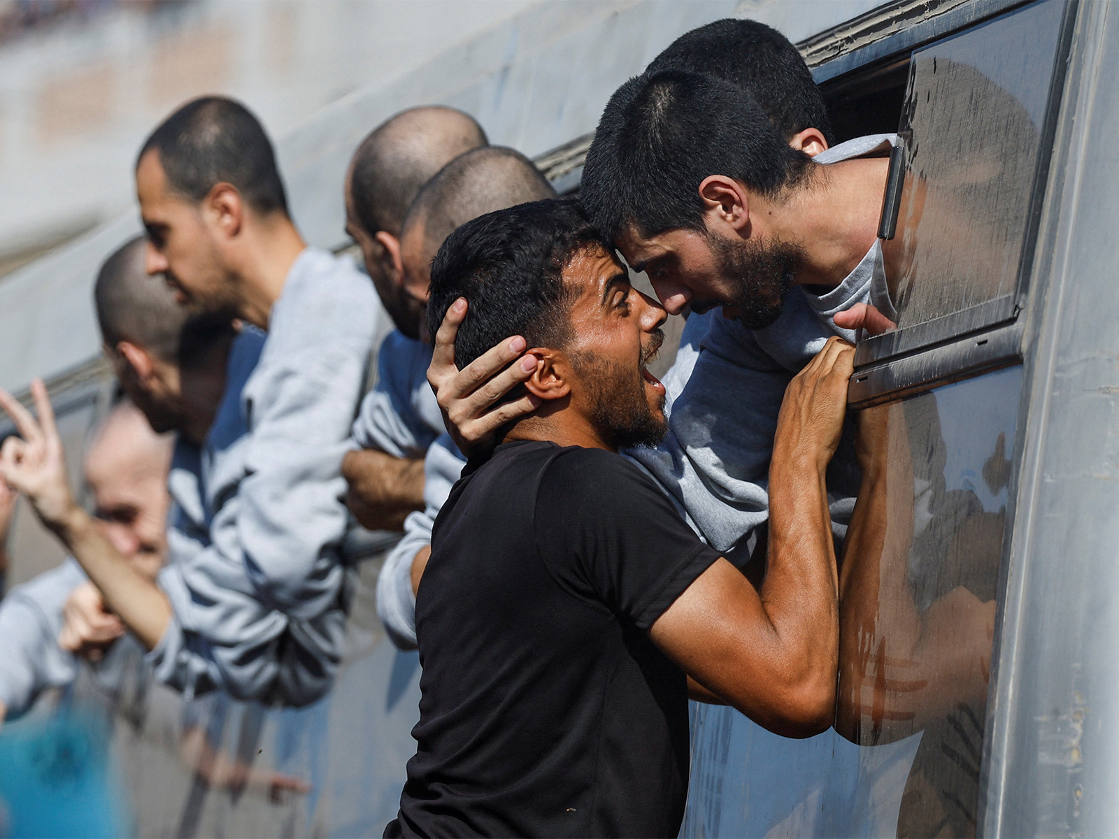 Hostages meet their kin (Photo/Reuters)