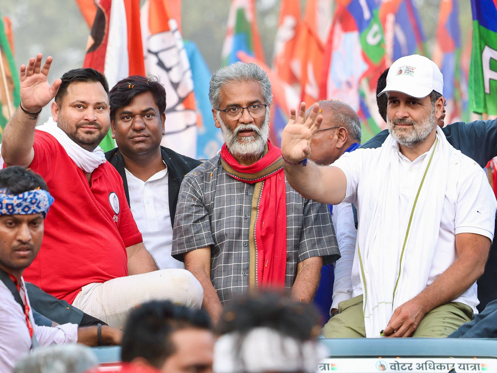RJD leader Tejashwi Yadav, CPI (ML) leader Dipankar Bhattacharya and Congress leader Rahul Gandhi (File Photo/ANI)