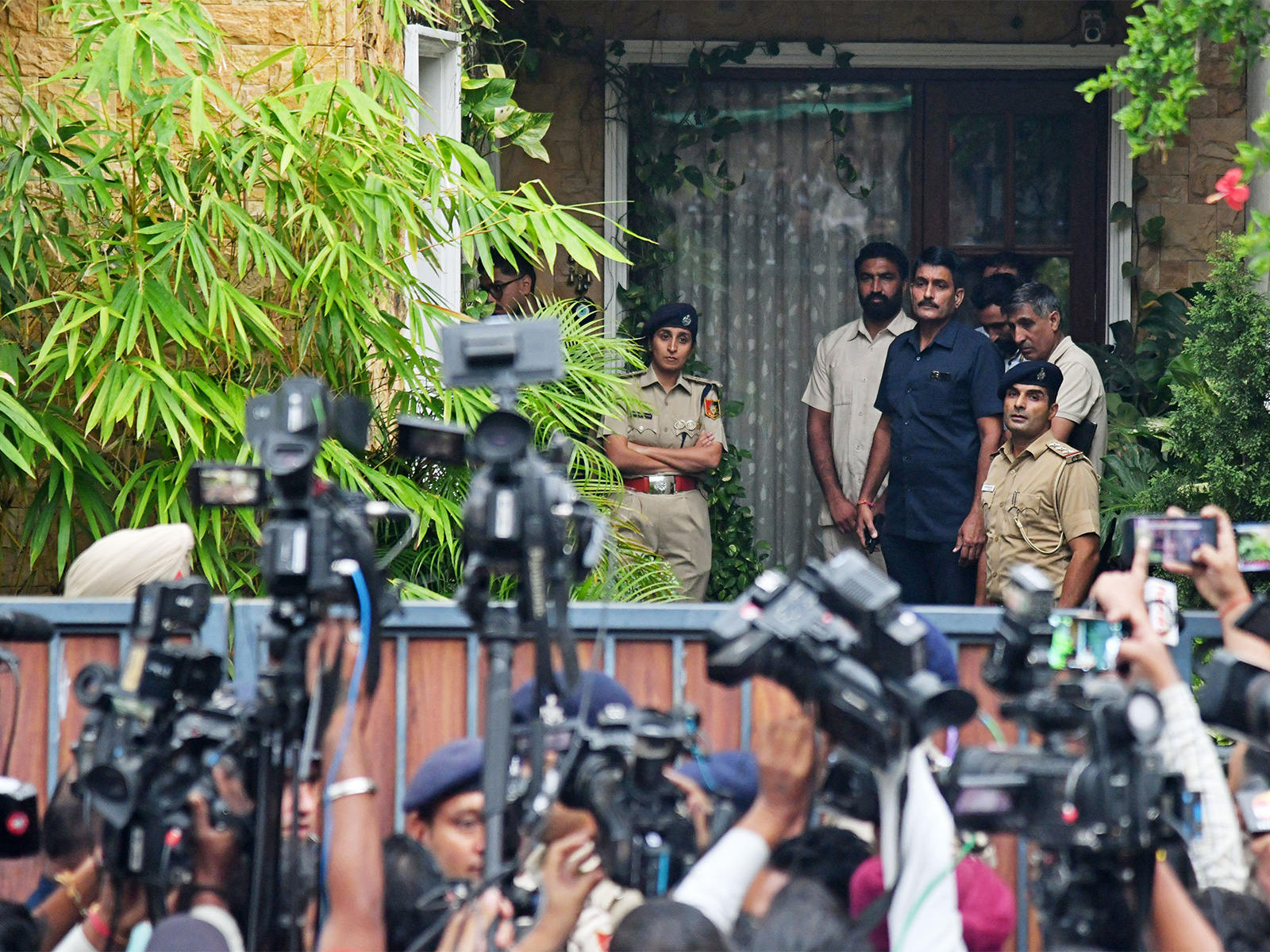 Police teams outside IPS Puran Kumar's residence (Photo/ANI)
