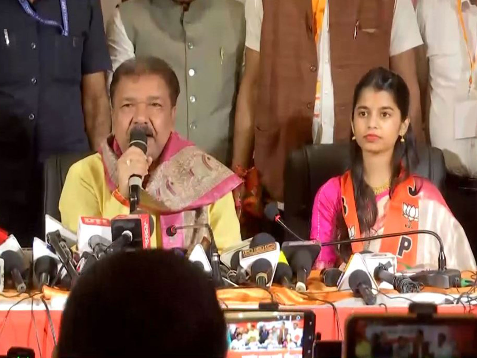 Bihar BJP chief Dilip Jaiswal and Folk singer Maithili Thakur after she joins BJP in Patna. (Photo/ANI)