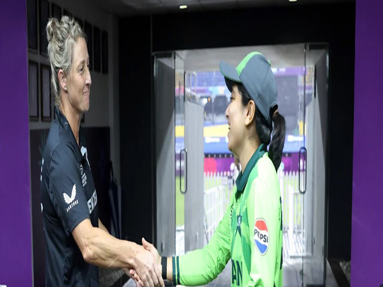 New Zealand and Pakistan Women captain shake hands aftyer the match was called-off (Photo: ICC)