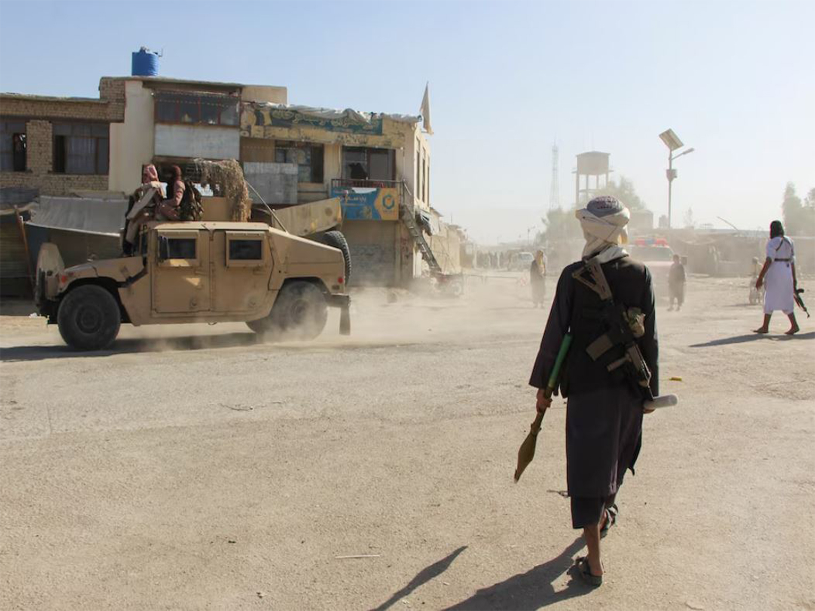 Taliban fighters patrol near the Afghanistan-Pakistan border in Spin Boldak, Kandahar Province, following exchanges of fire between Pakistani and Afghan forces in Afghanistan (File Photo/Reuters)