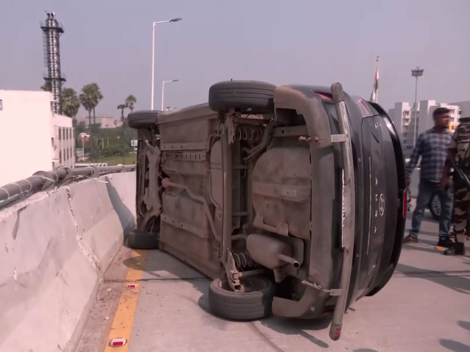 A car overturned at Patna Airport departure terminal building (Photo/ANI)