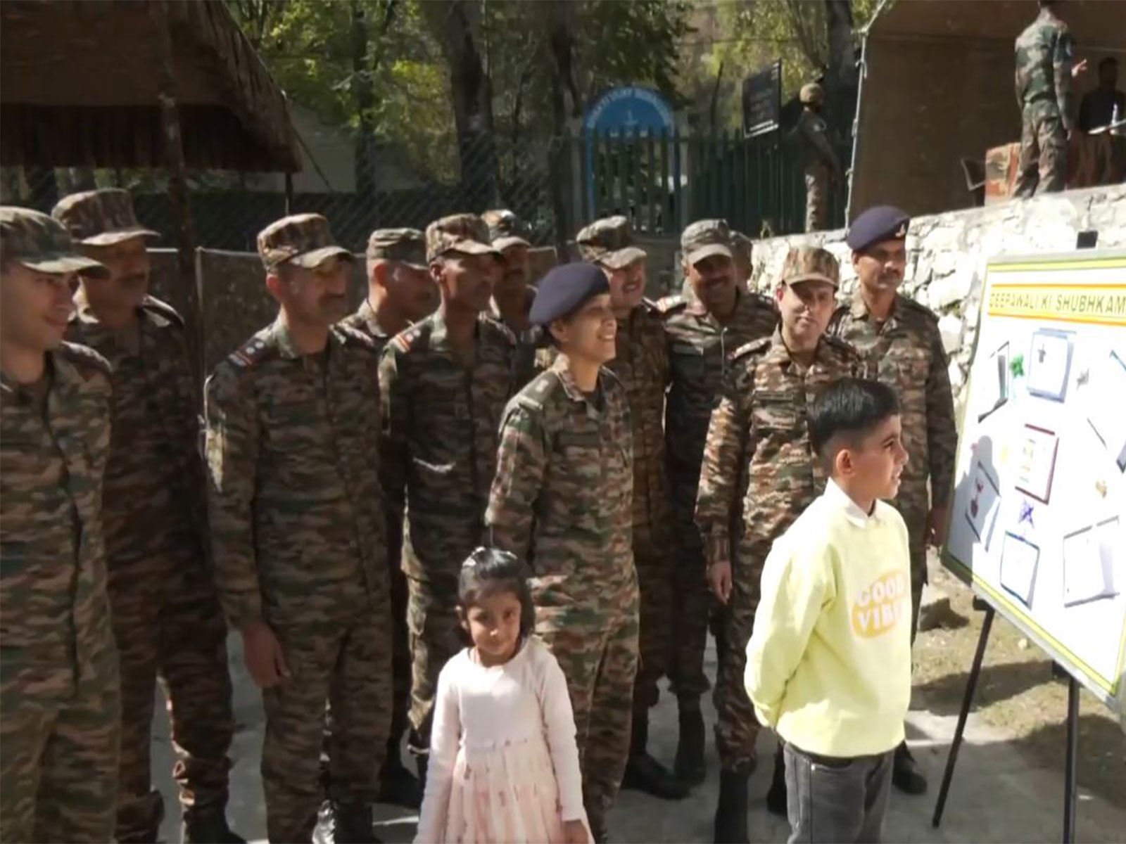 Indian Army officers near LOC in Tangdhar, celebrate Diwali with local children. (Photo/ANI)
