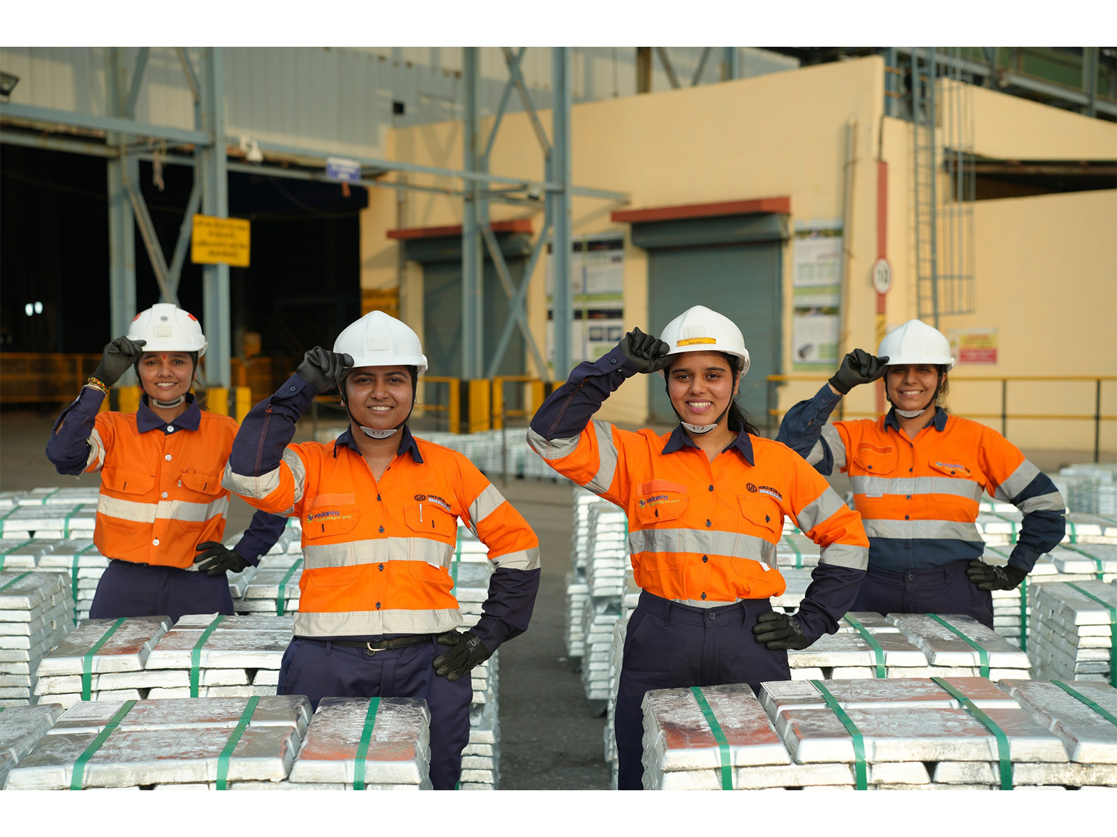 Hindustan Zinc employees with ingots