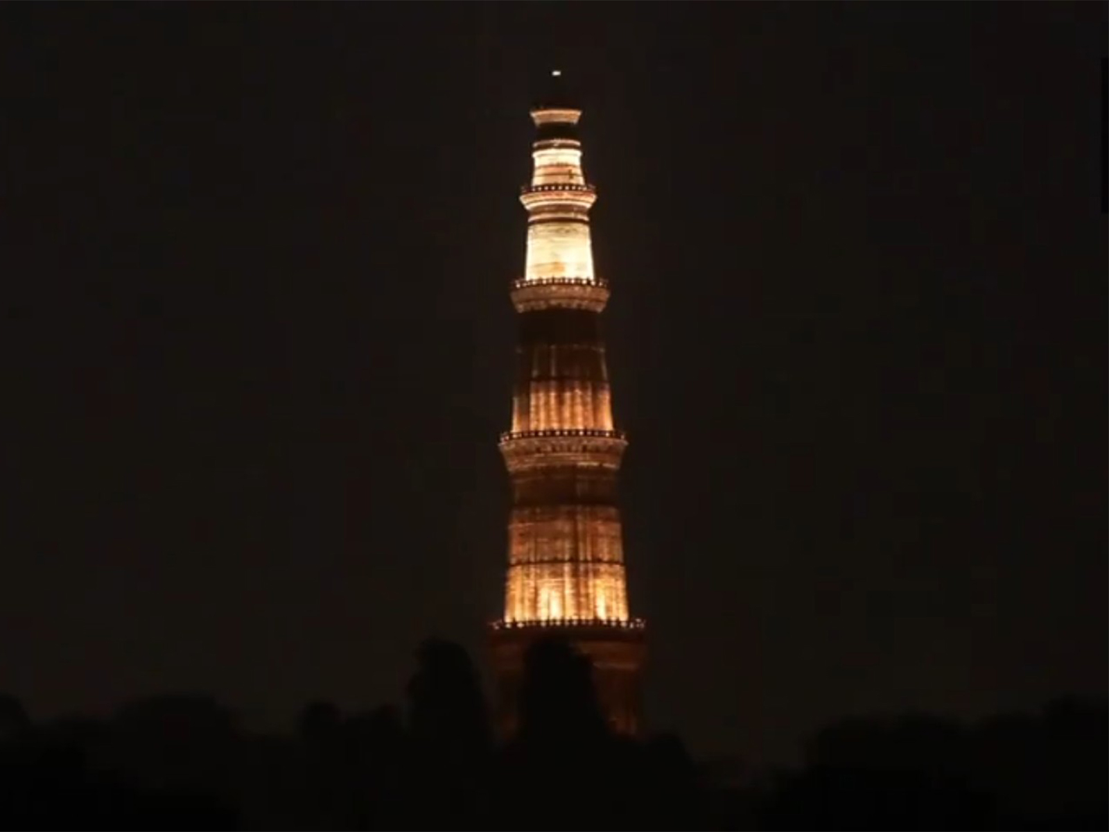 Qutab Minar in Delhi lit up with bright lights as India celebrates Diwali on Monday (Photo/ANI)
