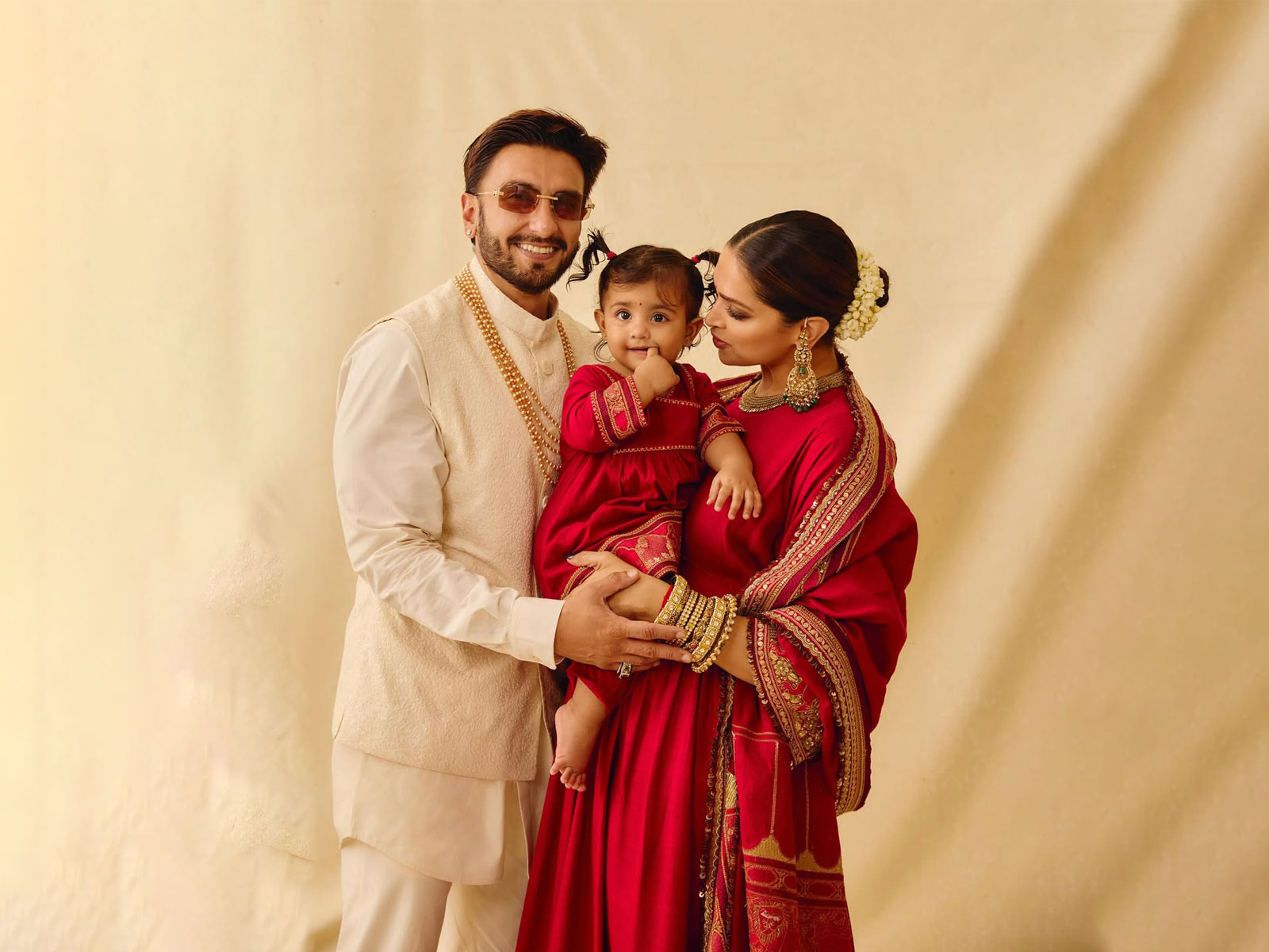 Deepika Padukone and Ranveer Singh with their daughter Dua (Image source: Deepika's Instagram)